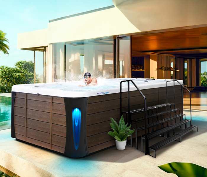 Calspas hot tub being used in a family setting - Latham